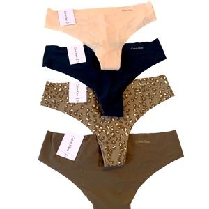 New With Tags Calvin Klein Thongs 4 count